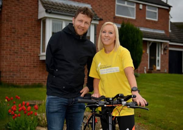 Laura Pearson is taking part in the Lanzarote Ironman competition to raise funds for the Air Ambulance, Laura is pictured with Jason Swift
