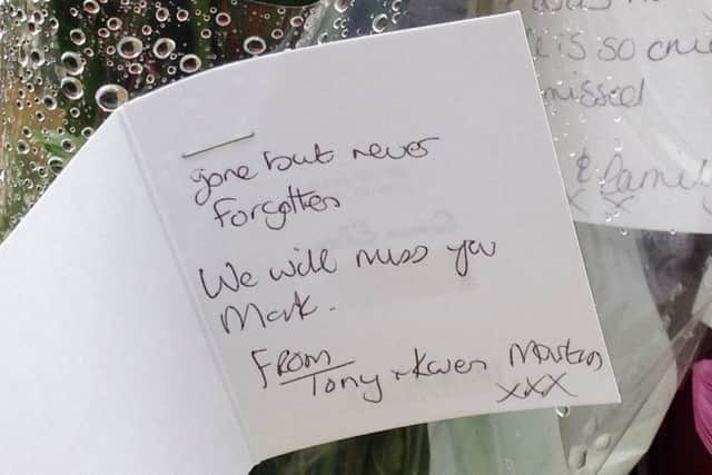 A card left at the scene of the accident.