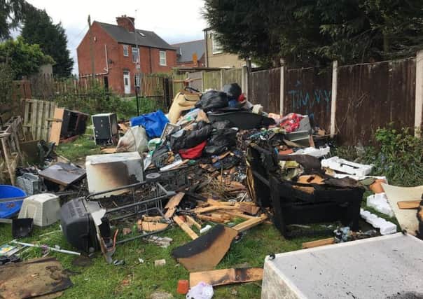 An unofficial rubbish dump has appeared just off Derby Road.