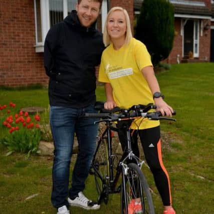 Laura Pearson is taking part in the Lanzarote Ironman competition to raise funds for the Air Ambulance, Laura is pictured with Jason Swift