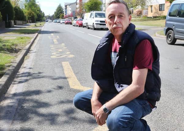 Road safety campaigner David Blythen is complaining about parking on zig-zag lines outside Stonelow Junior School