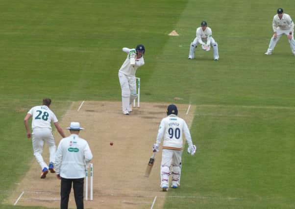 Durham's Keaton Jennings straight drives for 4 runs of the bowling of Jake Ball of Notts at the Riverside, on Easter Sunday