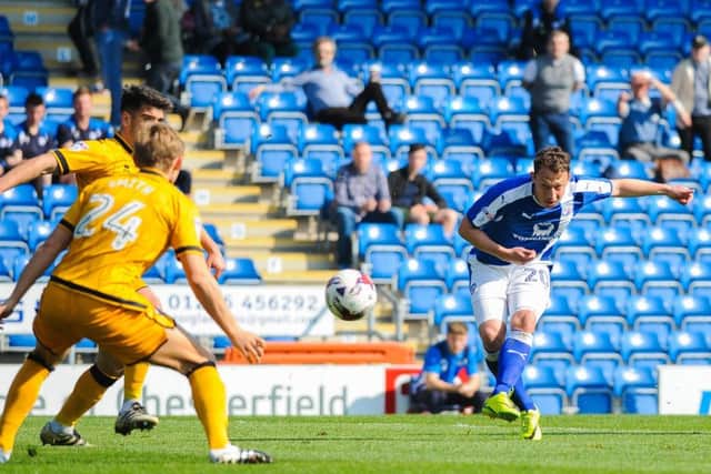 Chesterfield's forward Kristian Dennis (20) curls one wide.

Picture by Stephen Buckley/AHPIX.com. Football, League 1, Chesterfield v Port Vale; 08/04/2017 KO 3.00pm 
Proact stadium; copyright picture; Howard Roe; 07973 739229