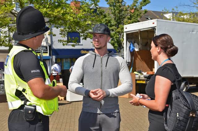Recruitment campaign by Derbyshire Constabulary at Shirebrook, pictured is Luke Smith chatting to Sgt Mark Church and Charlotte Hurst of Positive Action