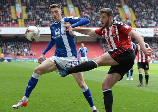 Picture Andrew Roe/AHPIX LTD, Football, EFL Sky Bet League One, Sheffield United v Chesterfield Town, Bramall Lane, 30/04/17, K.O 12pm

Chesterfield's Jake Beesley battles with United's Jack O'Connell

Andrew Roe>>>>>>>07826527594
