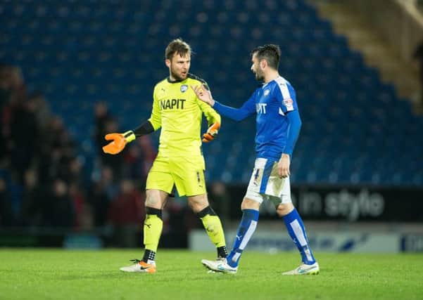 Chesterfield vs Doncaster Rovers - Tommy Lee and Sam Hird at full time - Pic By James Williamson