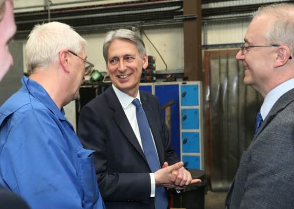 IN PICTURE: Chancellor Philip Hammond is given the guided tour of Millbrook Precision Engineering in Clay Cross.
