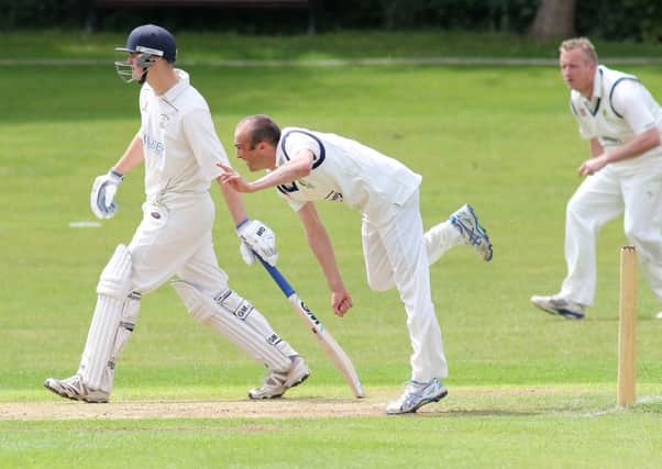 Andrew Parkin-Coates bowling for Chesterfield against Sandiacre Town in the Premier Division on Saturday.