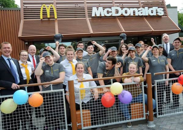 Staff at Matlock's new MacDonalds restaurant pictured before their opening on Thursday.