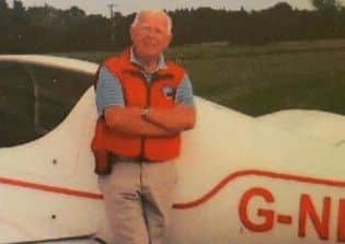 Pilot, Brian Allsop with his plane, Dolly.