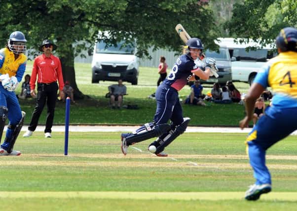 England's Lauren Winfield in batting action at Queens Park, during a warm-up match for the England Senior Ladies cricket team against Sri Lanka in preparation for the World Cup next week.