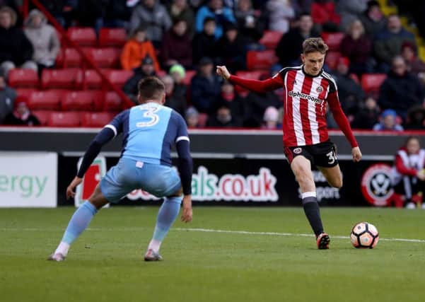 David Brooks of Sheffield United takes at shot on goal during the Emirates FA Cup Round One match at Bramall Lane Stadium, Sheffield. Picture date: November 6th, 2016. Pic Simon Bellis/Sportimage