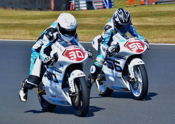 Wilson Racing duo Max Cook (30) and Charlie Atkins in Moto3 action at Snetterton. (PHOTO BY: Hairy Beast Pix)