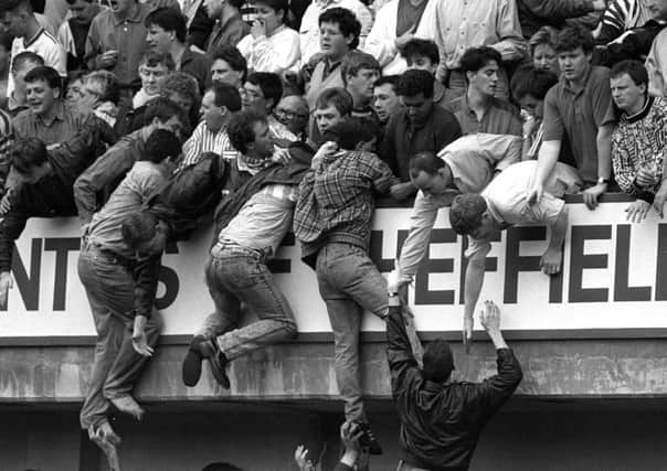 Fans trying to avoid the crush at Hillsborough in 1989.