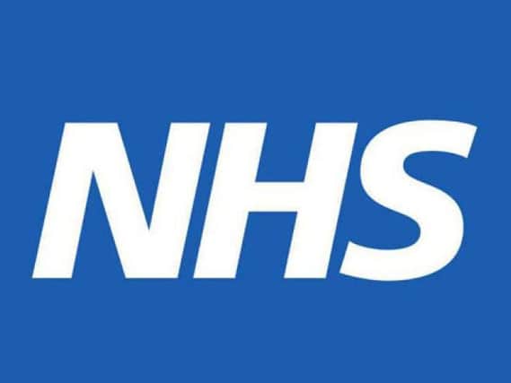 The NHS logo.