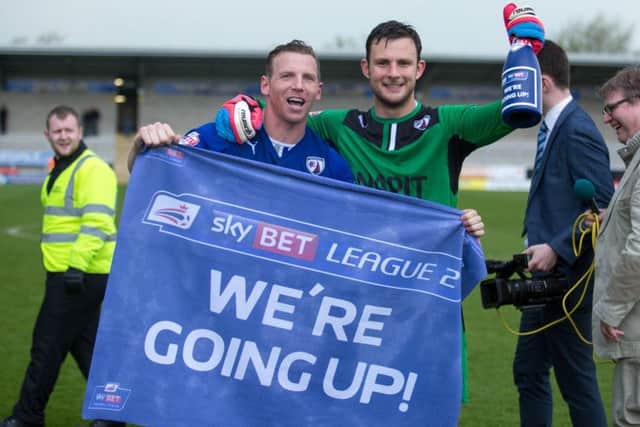 Tommy Lee and Ritchie Humphreys celebrate League One Football next season