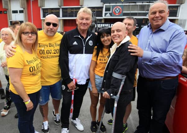 A sponsored walk for Imogen Ellis set off from Sheffield United ground at Bramall Lane on Saturday morning. Pictured are Rachael Shephard and Kim Clayton. Imogen is pictured with family, friends and former fotballers Tony Currie and Mel Sterland
