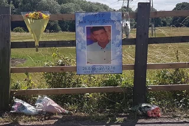 Tributes to Jack Robinson, who died last Boxing Day night after a collision near the same spot, close to tributes left over the weekend.