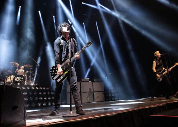 Green Day performing at Sheffield Arena. From left, Tre Cool, Billie Joe Armstrong and Mike Dirnt. Picture: Glenn Ashley.