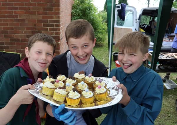 Yummy Codnor scout group ran the cake stall. L/R: Cain Gosling, Liam Pickering, Lewis Bell.