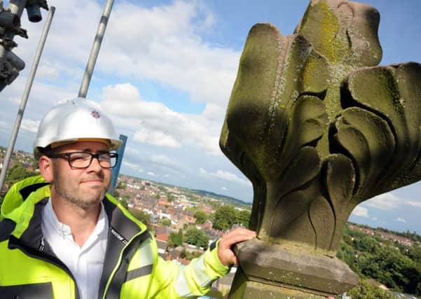 Michael Sheppard, the stone conservator and contracts manager at St. Thomas Church where the roof and pinnacles are being repaired.