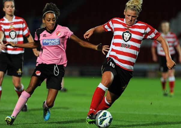 Belles' Millie Bright up against Lincoln's Jess Clarke. Picture: Andrew Roe