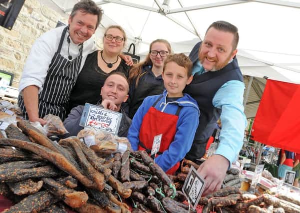 Jason Williams, right, from Bolsover's JAQUEST on his stall with TV chef Adam Palmer, Rachel Lancaster, and Joe, Noah and Grace Williams at the Bolsover Food Fesitval 2017.
