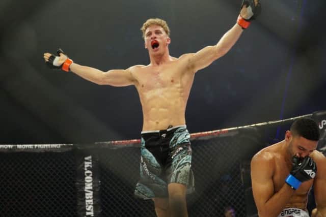 Chesterfield MMA fighter Sam Boult celebrates victory at ACB65 at Sheffield Arena