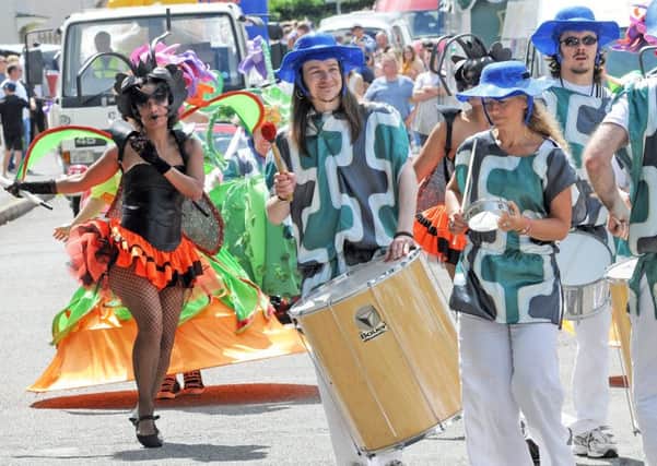 Members of Can Samba lead the procession through Tupton on Saturday.