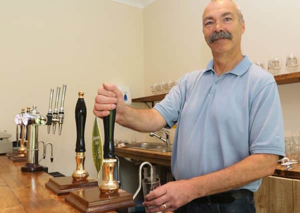 Stephen Eyre on the opening day of his new micro pub in Walton