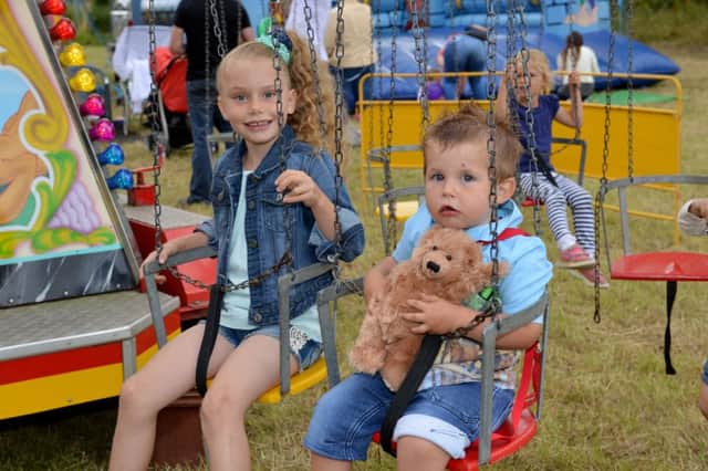 Ashgate Hospice Summer Fair, pictured are Erin Poxon, seven and Rocco Poxon, two