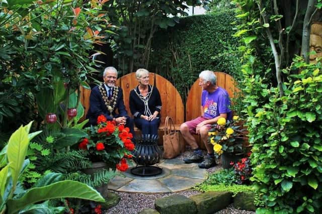 Richard Smithson, left, with Chesterfield Mayor and mayoress, Cllr Steve Brunt and Jill Brunt at last year's open day in their garden.