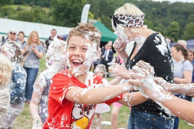 Mr Darcy custard pie fights at Bakewell Baking Festival.