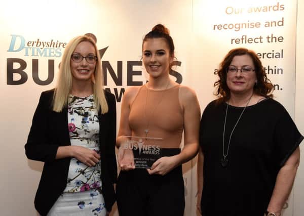 Lucy Rose receives her award for Apprentice of the Year from Emma Loughlin at the Derbyshire Times Business Awards 2016. Picture: Andrew Roe