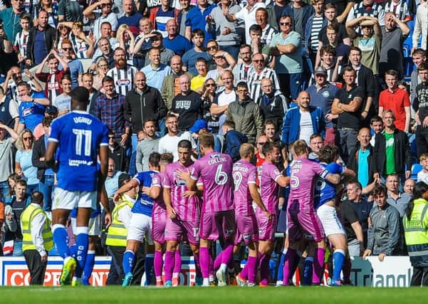 Both teams are seperated after coming together.

Picture by Stephen Buckley/AHPIX.com. Football, League 2, Chesterfield v Grimsby Town; 05/08/2017 KO 3.00pm 
Proact; copyright picture; Howard Roe; 07973 739229