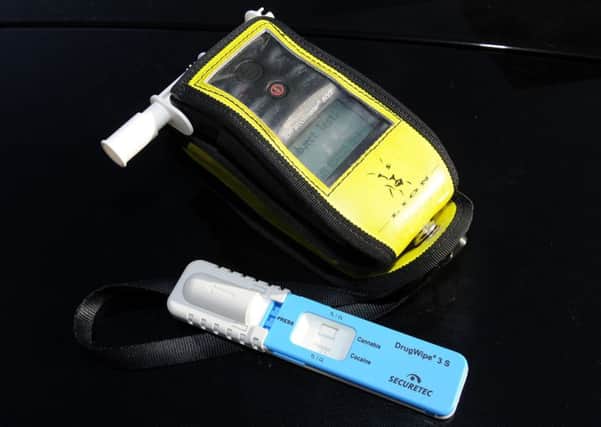 A breathalyzer and drug swob. Picture: Andrew Roe