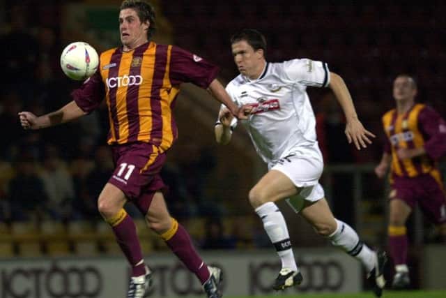 Bradford City V Derby County.. Sept 30, 2003.
Andy Gray takes control as he makes an attack followed closely by Gary Caldwell, Gray scored but his effort was ruled offside.