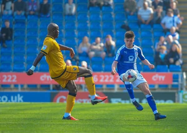 Chesterfield's defender Joe Rowley (39) tries to flick it past Port Vale's defender Andrey Bikey (39).

Picture by Stephen Buckley/AHPIX.com. Football, League 1, Chesterfield v Port Vale; 08/04/2017 KO 3.00pm 
Proact stadium; copyright picture; Howard Roe; 07973 739229