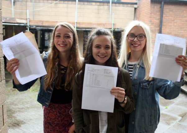 Happy with their results are Grace Spencer, Rose McGowan and Charlotte Winder.