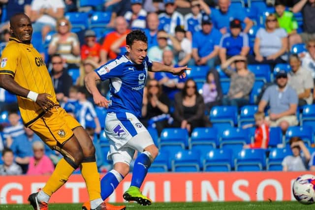 Chesterfield's forward Kristian Dennis (20)sets up Chesterfields opener.Picture by Stephen Buckley/AHPIX.com. Football, League 1, Chesterfield v Port Vale; 08/04/2017 KO 3.00pm Proact stadium; copyright picture; Howard Roe; 07973 739229