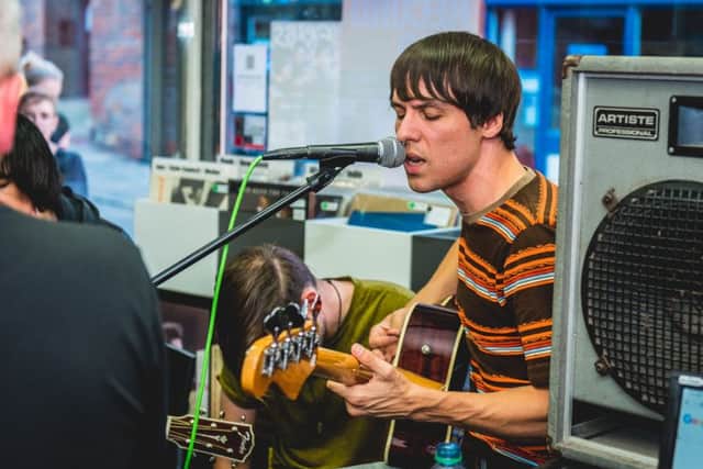 Gary Jarman, pictured, plays in the record shop. Photo: Tarquin Clark.