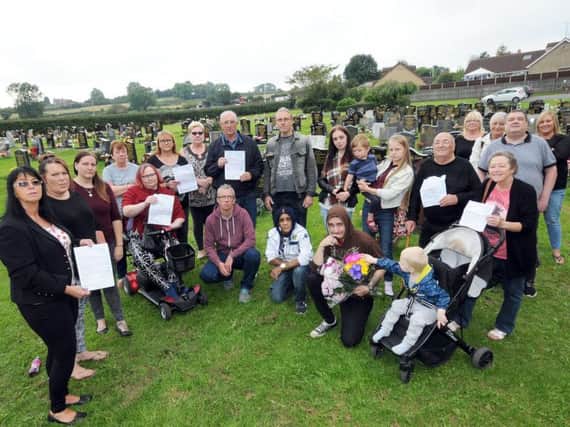 Killamarsh residents - including Margaret Bedford, left - say North East Derbyshire District Council is 'heartless' for telling them to remove personal items from the graves of their loved ones. Pictures by Anne Shelley.