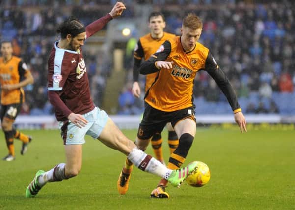 Sam Clucas go's past George Boyd.
Burnley v Hull City.  Turf Moor.  SkyBet Championship.  6 February 2016.  Picture Bruce Rollinson