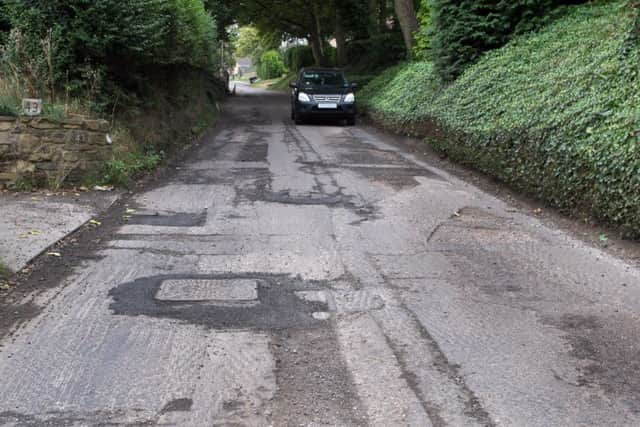 Longedge Lane has been planed off and left for weeks, without being resurfaced.