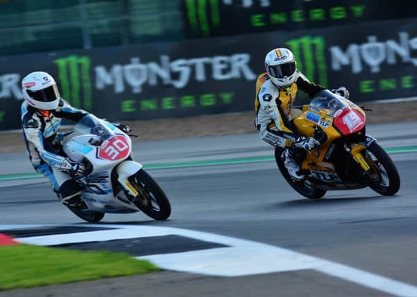 Championship leader Max Cook (number 30) challenges his main rival, Victor Rodriguez, at Silverstone. (PHOTO BY: Hairy Beast Pics)