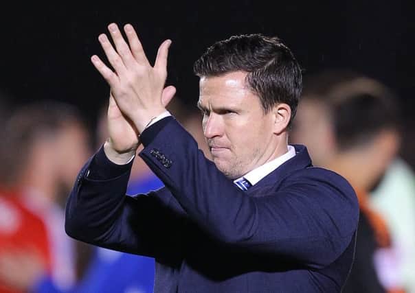 Picture by Gareth Williams/AHPIX.com; Football; Sky Bet League Two; Colchester United v Chesterfield; 12/09/2017 KO 15.00; Weston Homes Community Stadium; copyright picture; Howard Roe/AHPIX.com;  Chesterfield boss Gary Caldwell applauds the away support after a battling draw at Colchester