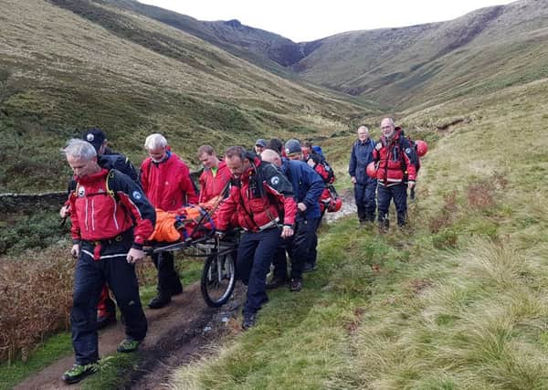 Buxton Mountain Rescue Team rescue injured walker on Kinder Scout.