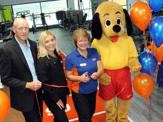 Alfreton Leisure Centre's new gym is officially opened on Friday by their Fitness Operations manager Barbara Bexton, second right, assisted by centre mascot, Hector the Hound, Contract manager Peter Sharkey and Health and Wellbeing manager - Amber Valley Contract, Maxine Start.