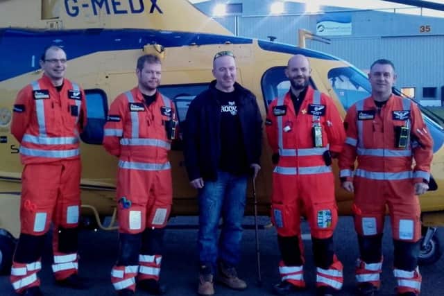 Seriously injured motorcyclist Lee Oldham, of Chesterfield, was reunited with the air ambulance rescue crew that saved his life.
