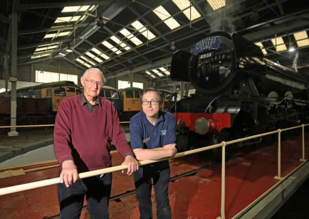 Former Kings Cross shedmaster Peter Townend and Martin Braisford from Barrowhill Roundhouse are pictured with Flying Scotsman. Picture: Chris Etchells